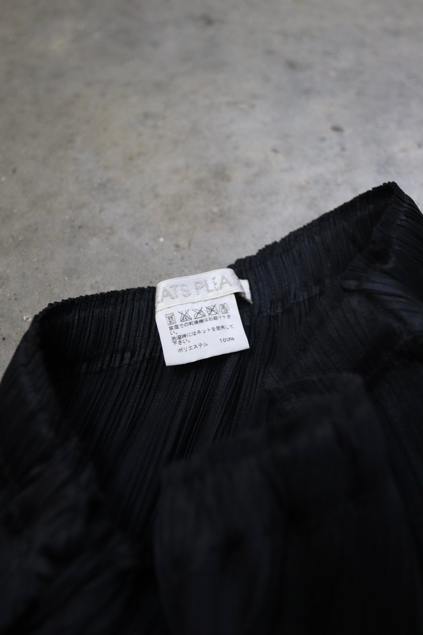 PLEATS PLEASE