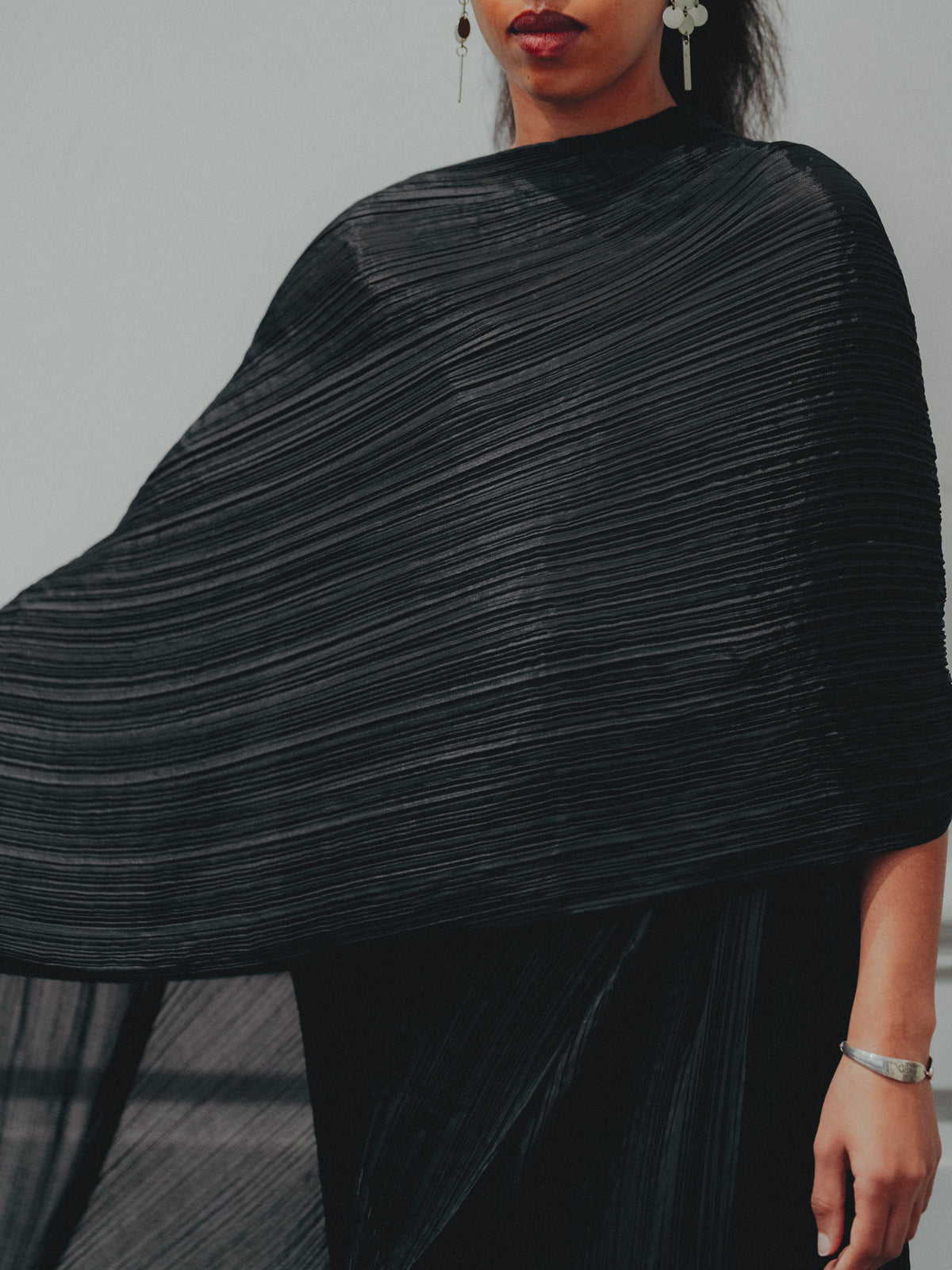 PLEATS PLEASE
