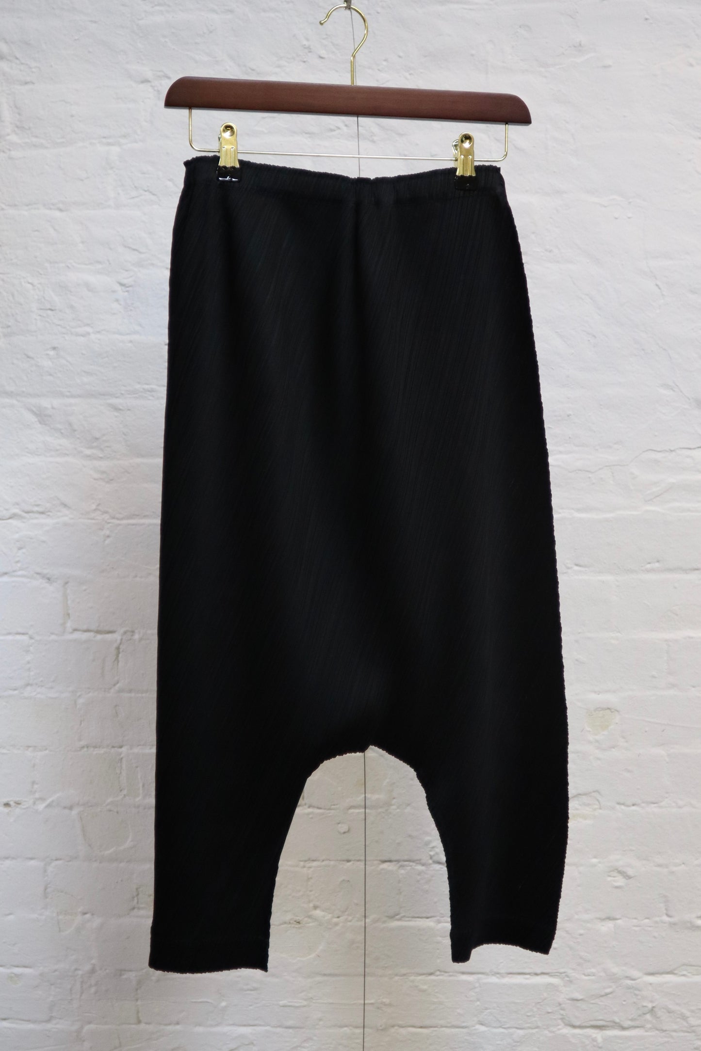 PLEATS PLEASE